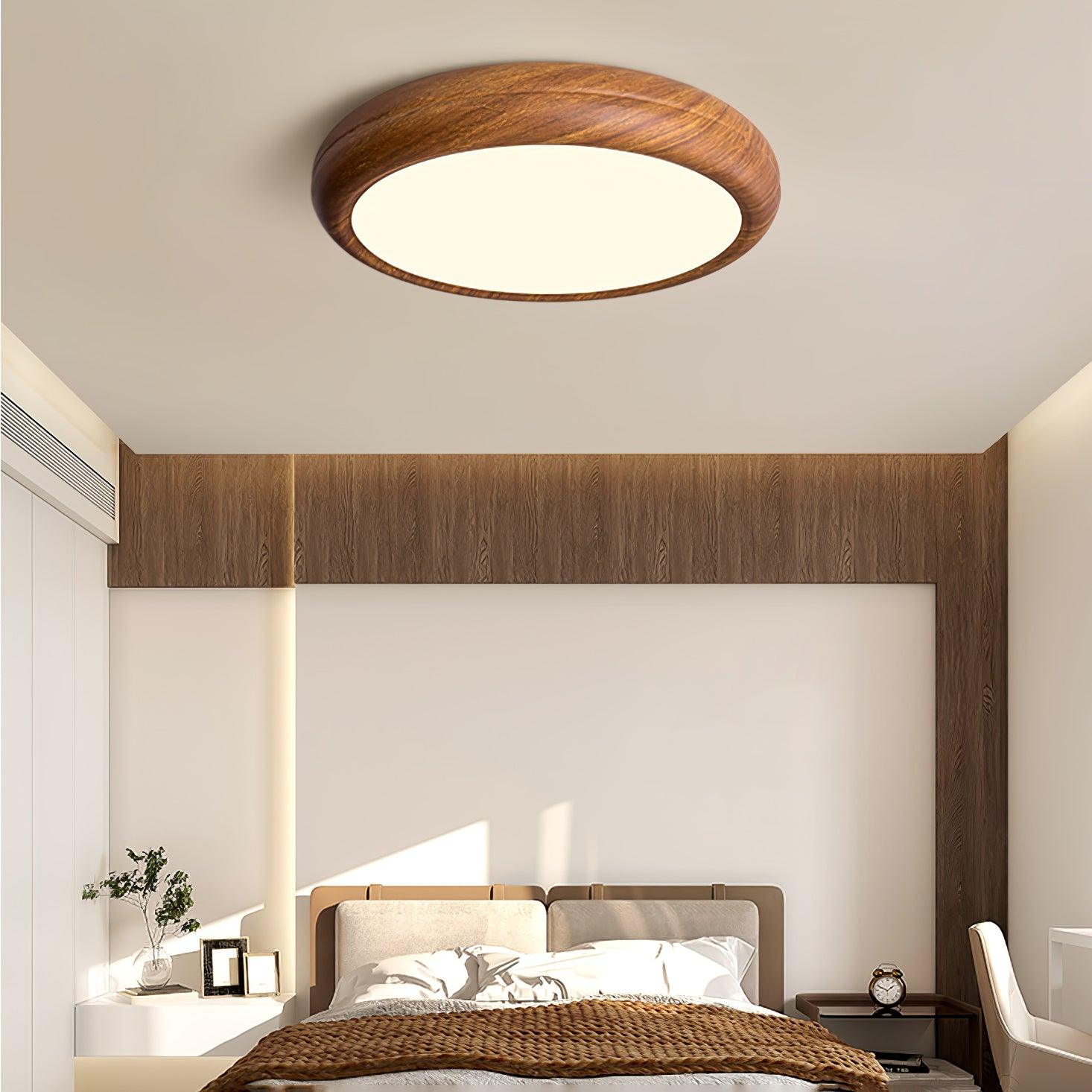 Wood grain flush mount ceiling light in a bright room