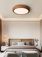 Wood grain ceiling light with warm even glow at night