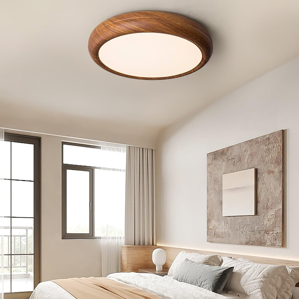Wood grain ceiling light glowing above a styled room