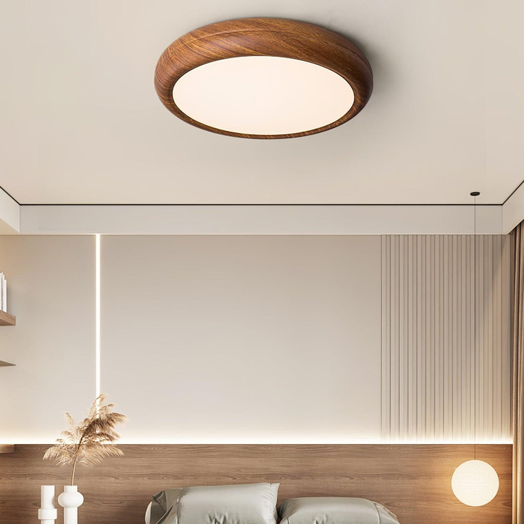 Wood grain flush mount ceiling light detail of the panel