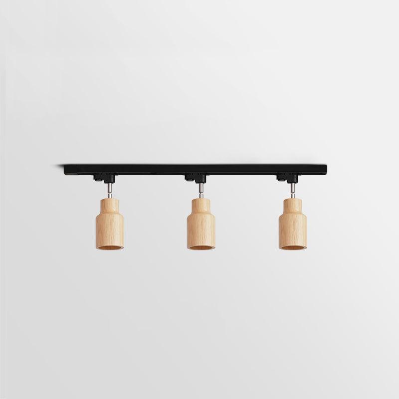 Wood track ceiling lamp mounted on a ceiling lighting a living space