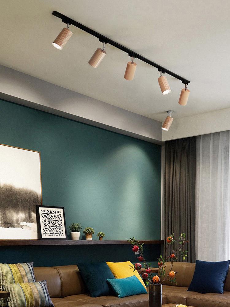 Wood track ceiling lamp lighting a cosy reading nook