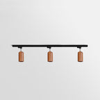 Wood track ceiling lamp with rubberwood canopy in a modern interior