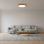 Round rubberwood ceiling light glowing gently