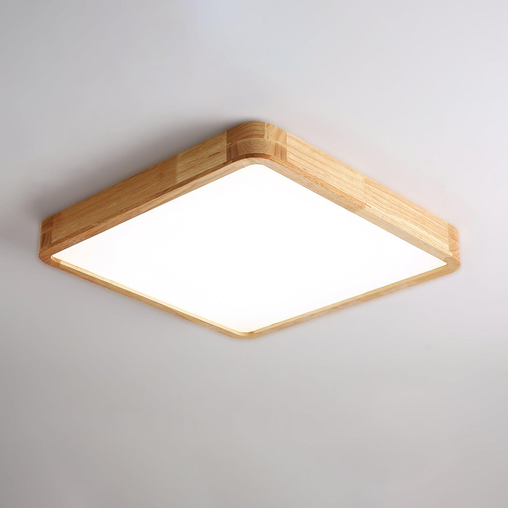 Square wooden ceiling light glowing above a living space