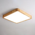 Square wooden ceiling light glowing above a living space
