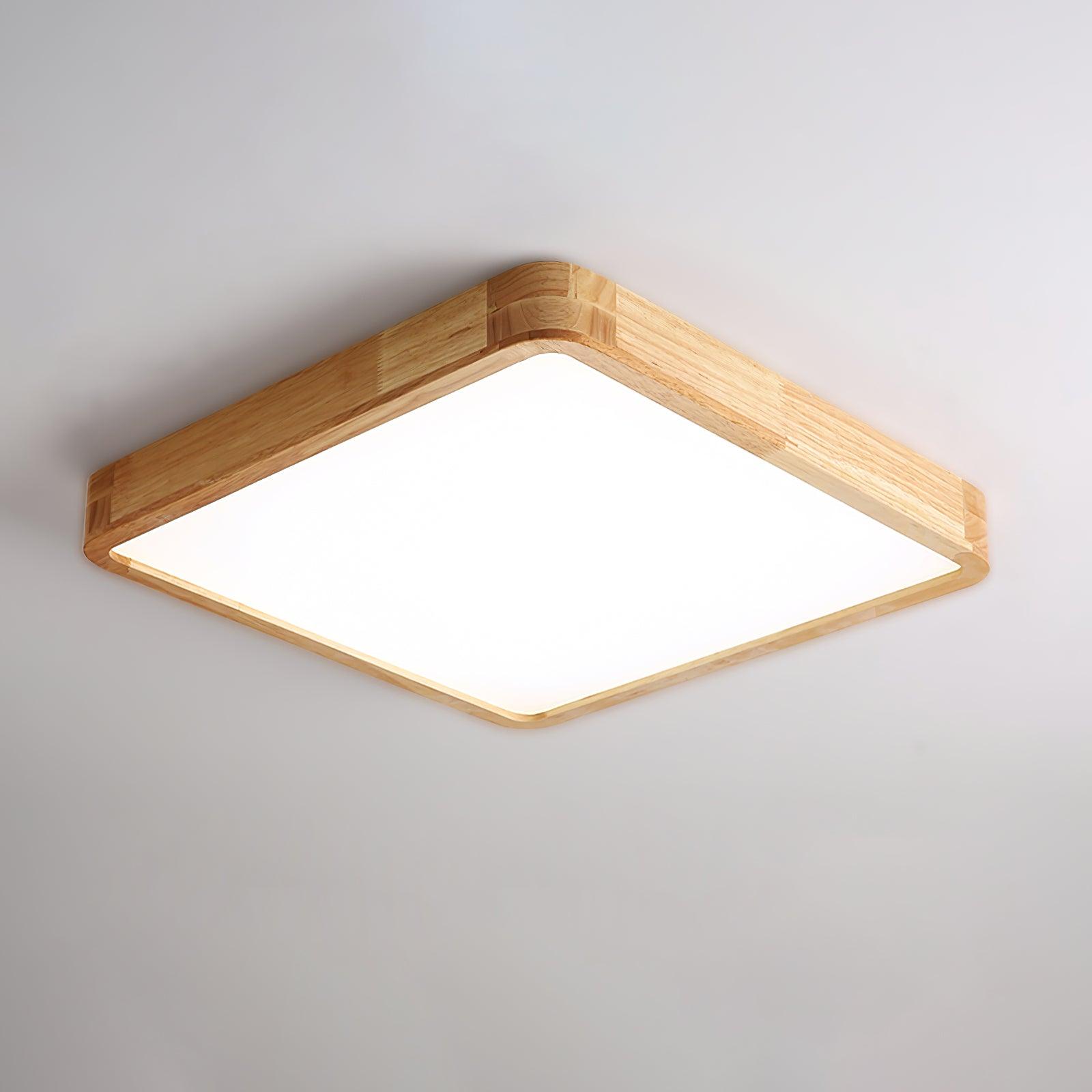 Square wooden ceiling light glowing above a living space