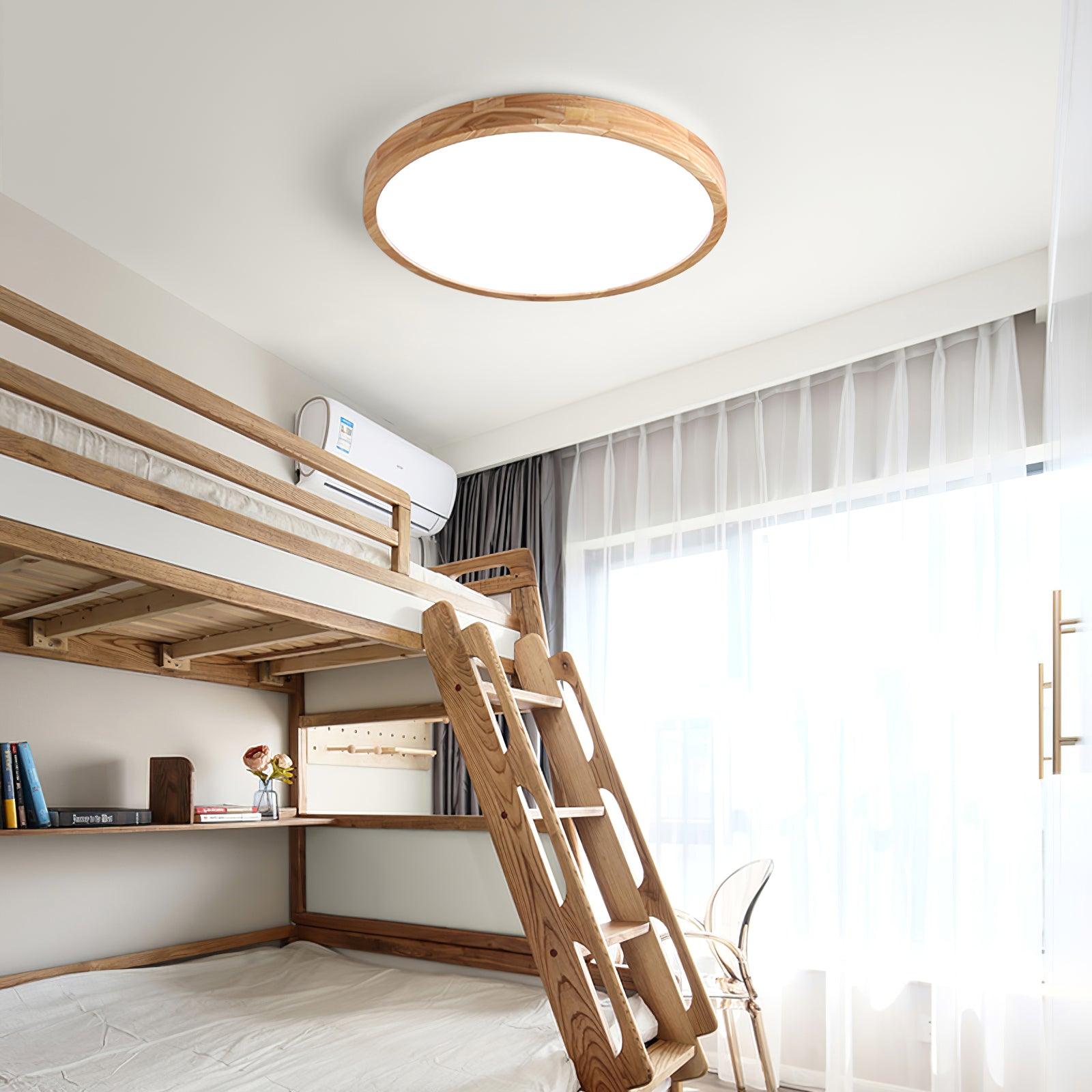Wooden geometric ceiling light glowing in a styled space