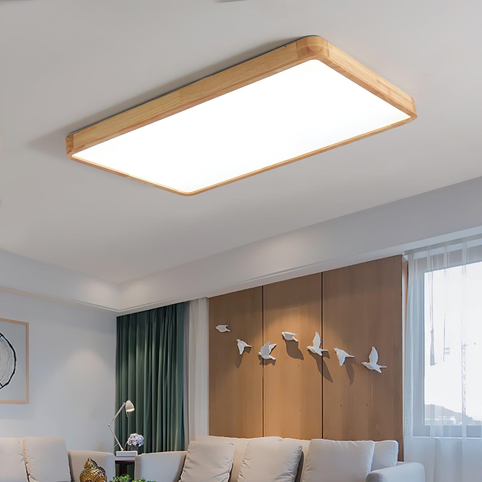 Square wooden ceiling light lit softly overhead