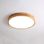Slim rubberwood ceiling light mounted flush to a ceiling