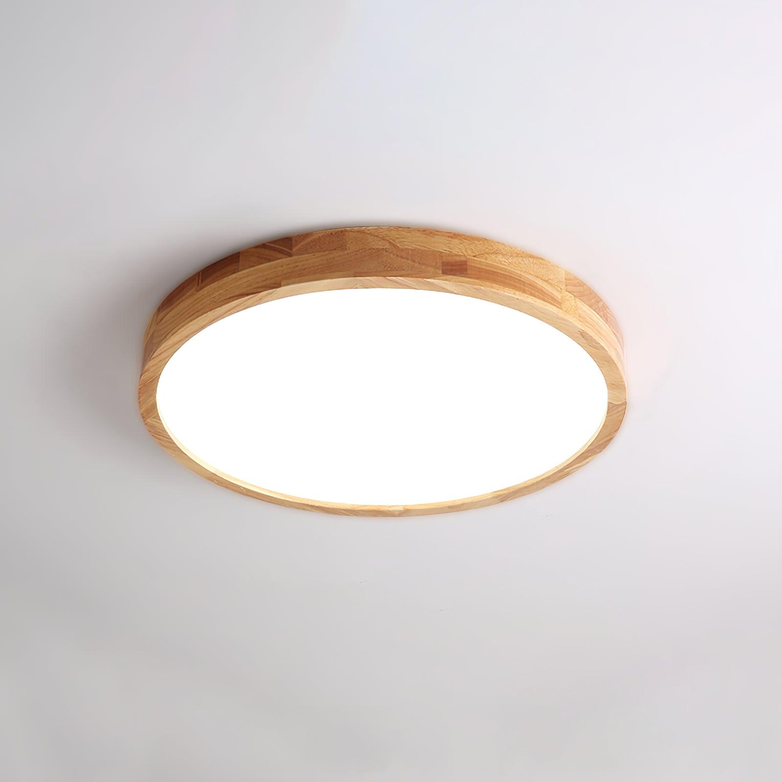Slim rubberwood ceiling light mounted flush to a ceiling