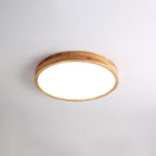 Wooden geometric ceiling light glowing in a modern room