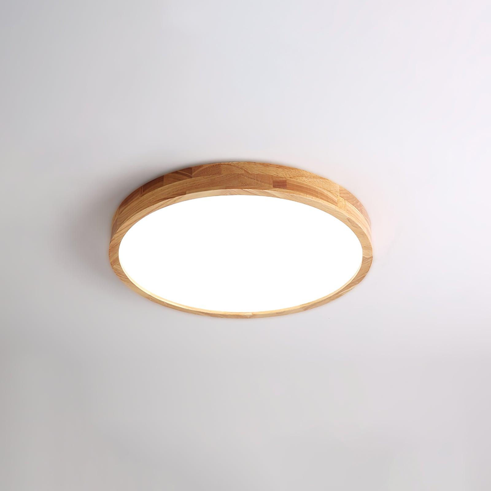 Wooden geometric ceiling light glowing in a modern room
