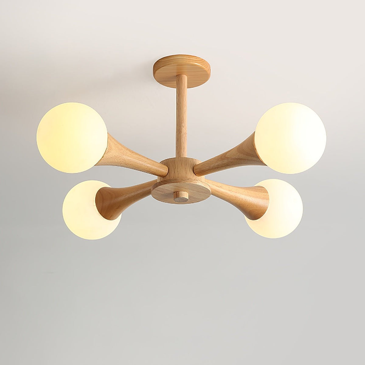 Against a soft grey-beige gradient backdrop, this Clérachic chandelier is shown unlit at a gentle angle, its pale wood arms fanning outward.