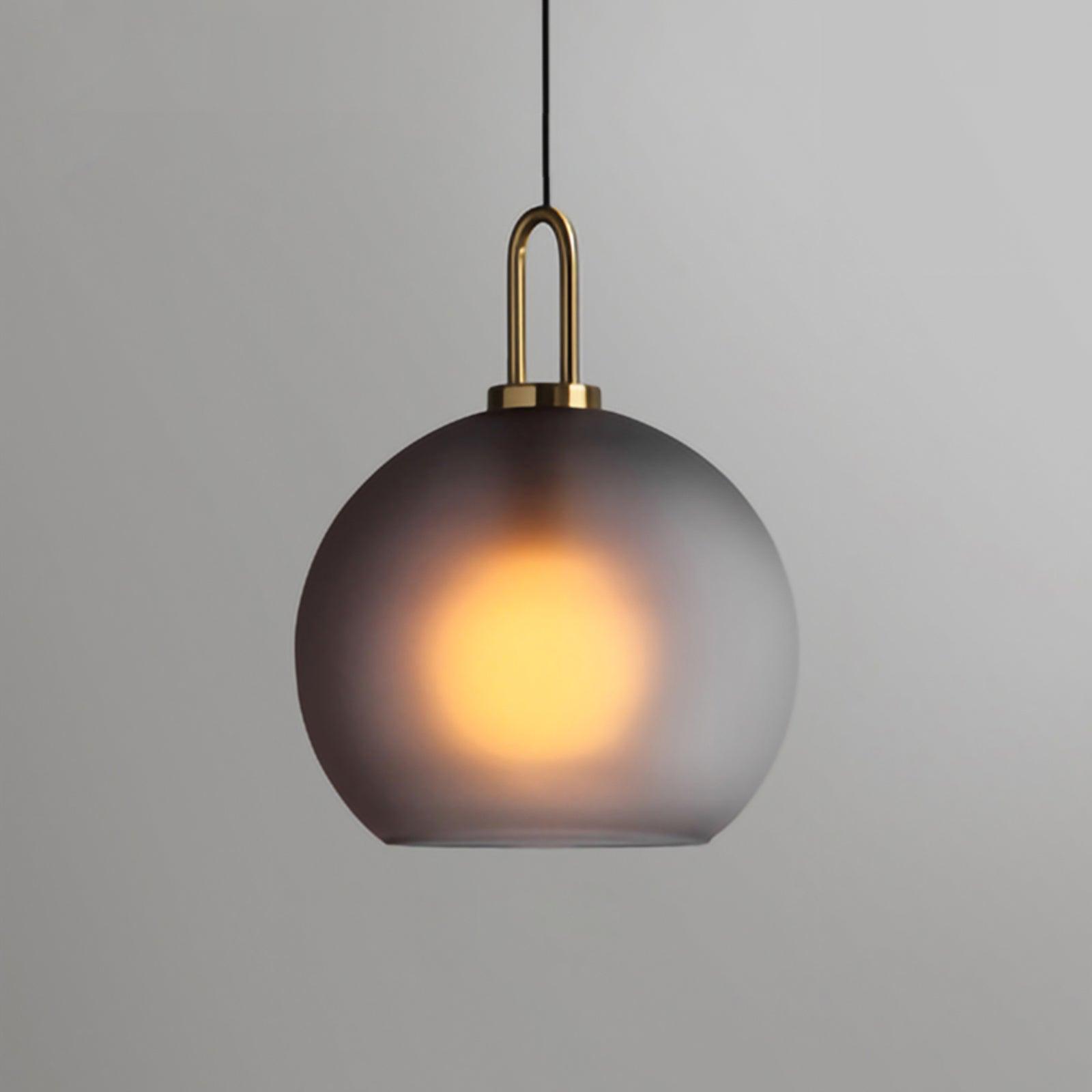 Frosted smoke-gray glass pendant light with warm filament, 30 cm
