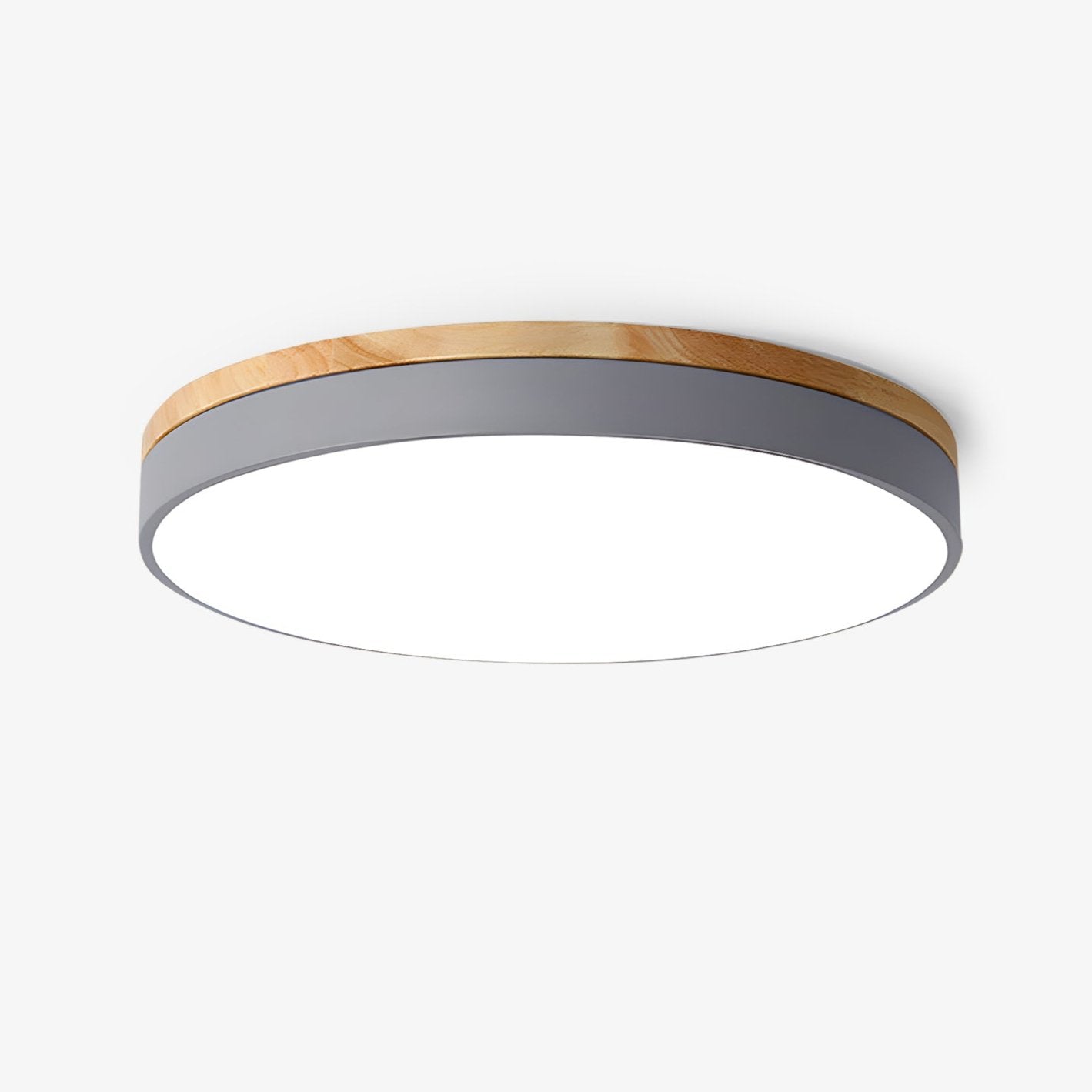 Circular wood ceiling lamp glowing softly in a calm bedroom setting