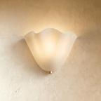Clérachic red glass wall light unlit, showing the fold in the sheet