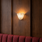 Clérachic glass wall light detail, thickness of the sheet visible at the edge