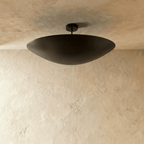 Clérachic ceiling light in matte black, the elongated bowl shade viewed from a slightly different angle.