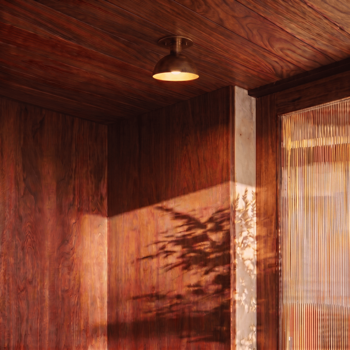 Clérachic ceiling light glowing on a wood-paneled ceiling beside a sunlit woven strand curtain.