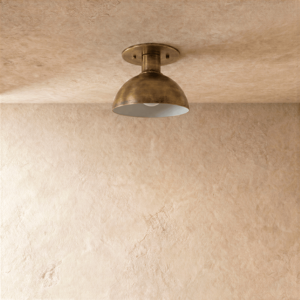Clérachic ceiling light in vintage brass, close front view of the domed shade and round canopy.