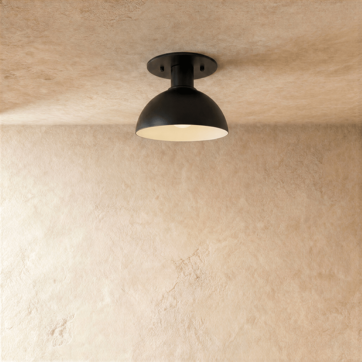 Clérachic ceiling light in matte black, a domed metal shade mounted flush against a plaster ceiling.