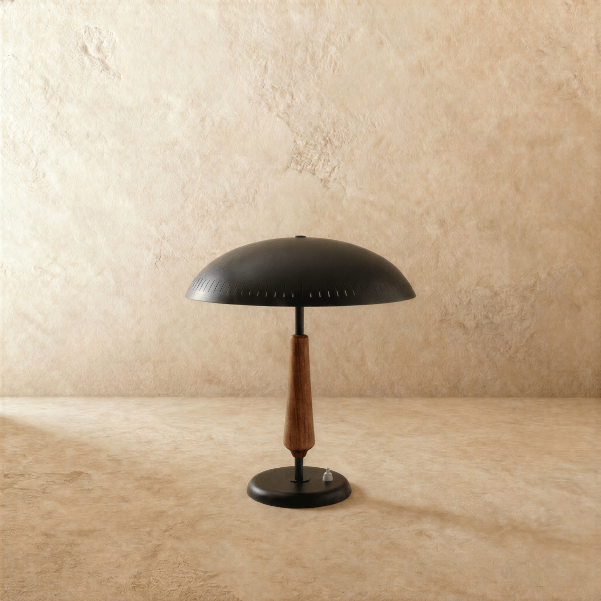 Clérachic table lamp in matte black, the dome shade and walnut neck viewed from a slightly different angle.