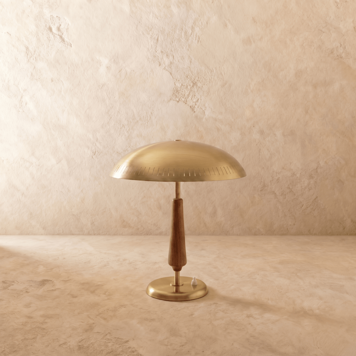 Clérachic table lamp in polished brass, the dome shade and walnut stem shown from another angle.