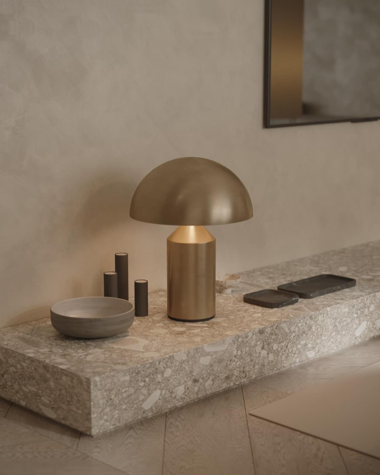 Sculptural metal table lamp with rounded dome top detail