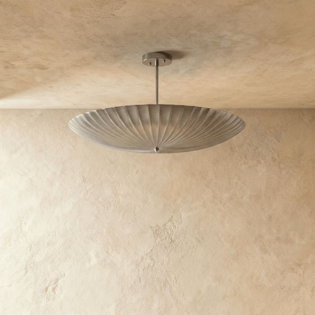Clérachic pendant light in chrome, front view of the fluted disc shade and slim ceiling rod.
