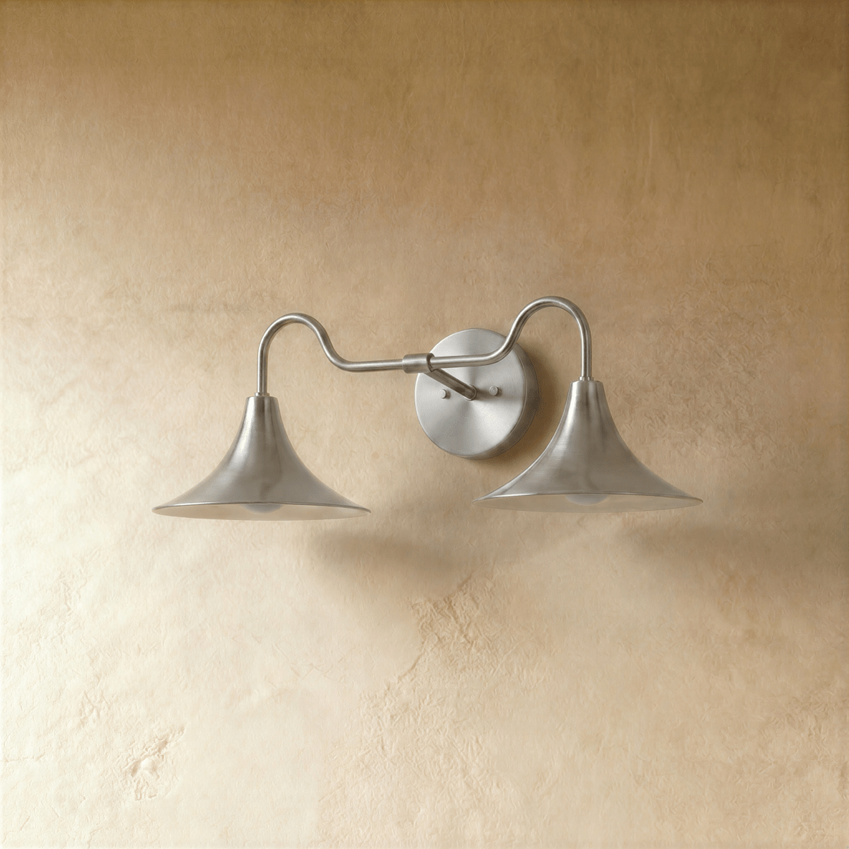 Clérachic double-head wall sconce in chrome, the trumpet shades and gooseneck arms shown from another angle.
