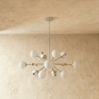 Clérachic chandelier in chrome shown from another angle, globes radiating outward from the rod.