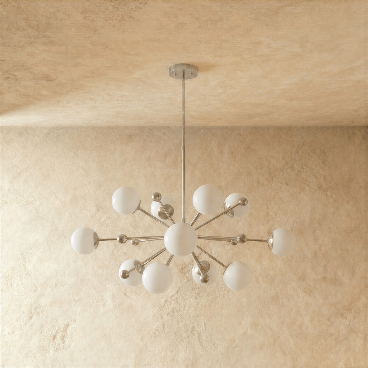 Clérachic chandelier in chrome shown from another angle, globes radiating outward from the rod.