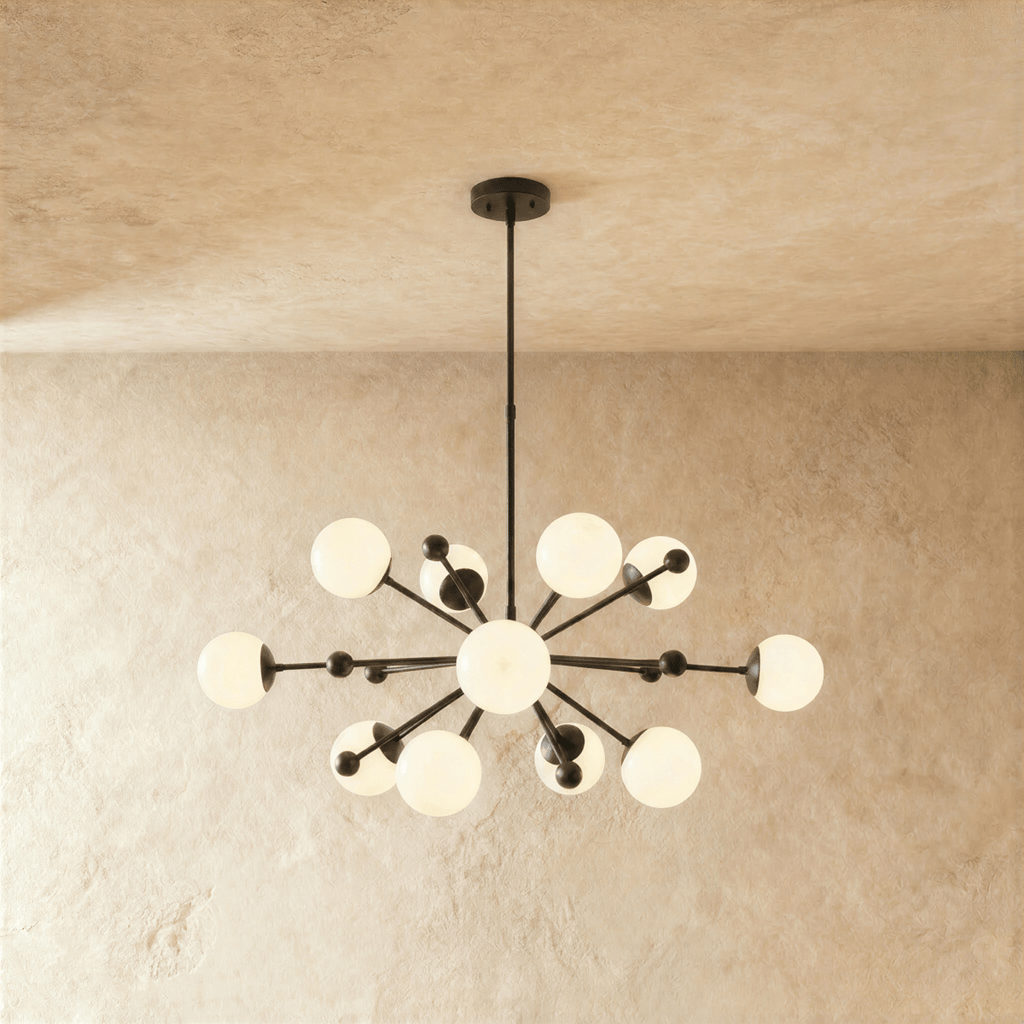 Clérachic chandelier in matte black, a sputnik burst of opal glass globes on slender arms.
