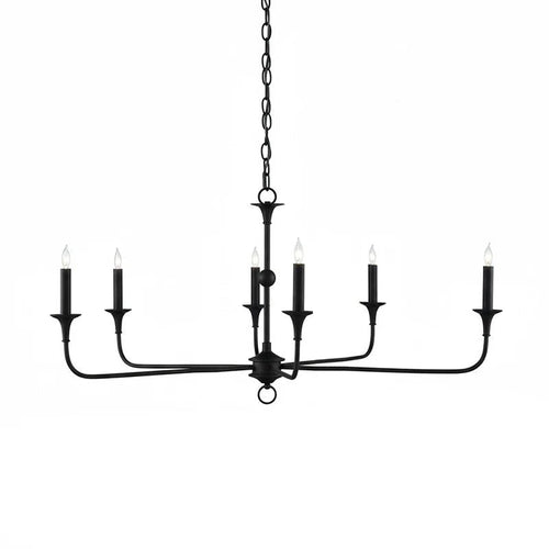 Candle chandelier shown in an elegant entryway with candle-style bulbs lit