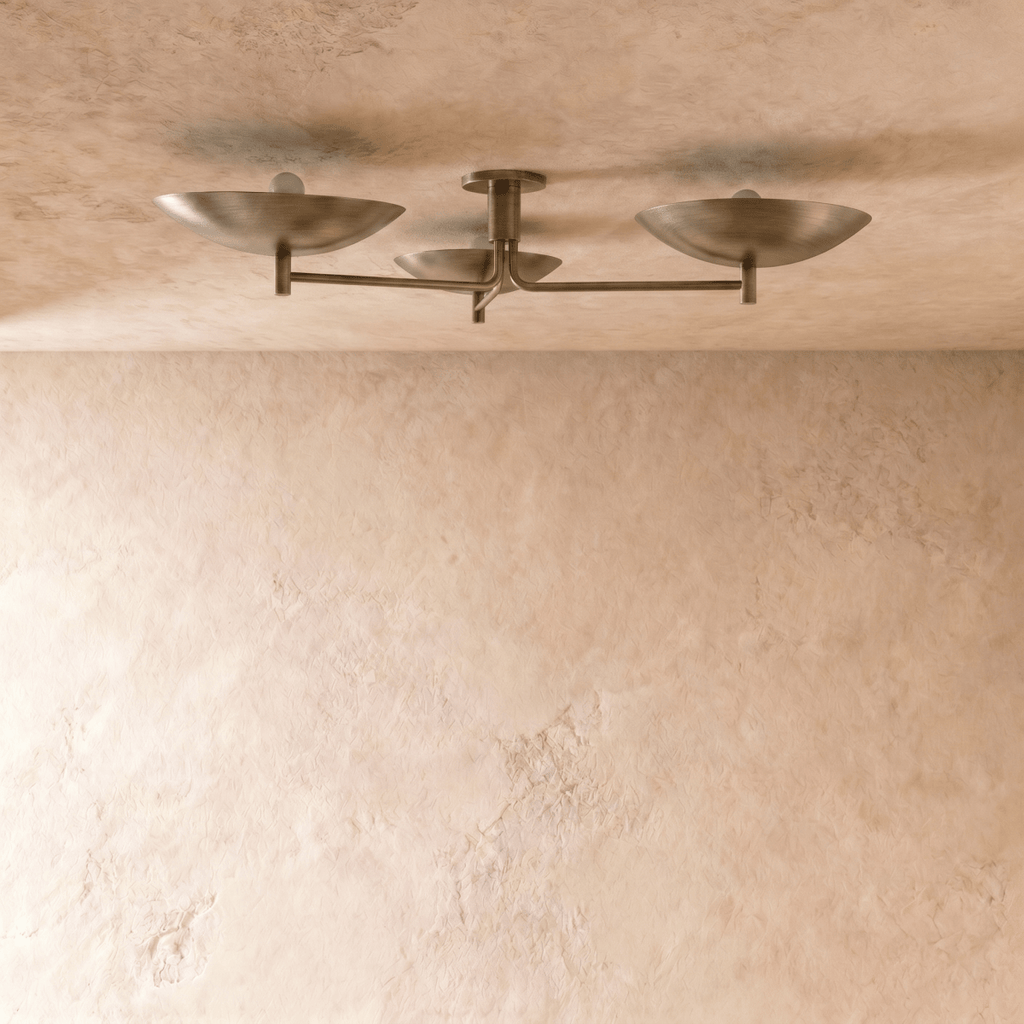 Clérachic ceiling light, front view of the three angled shades branching from a round ceiling canopy.