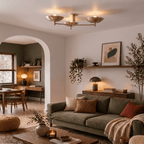 Clérachic ceiling light in brass over a living room with an arched doorway and potted greenery.