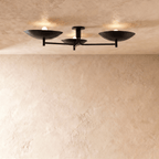 Clérachic ceiling light in matte black, three boat-shaped shades branching from a central mount.