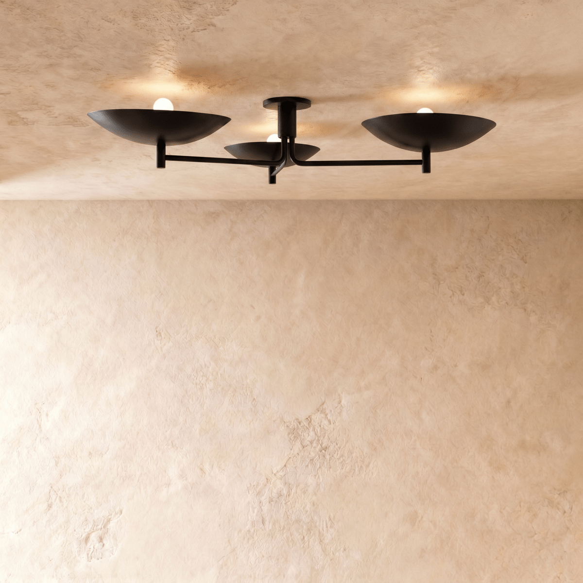 Clérachic ceiling light in matte black, three boat-shaped shades branching from a central mount.