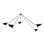 Black spider ceiling light against a light backdrop