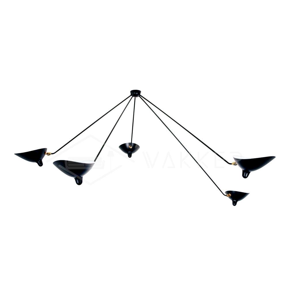 Black spider ceiling light against a light backdrop