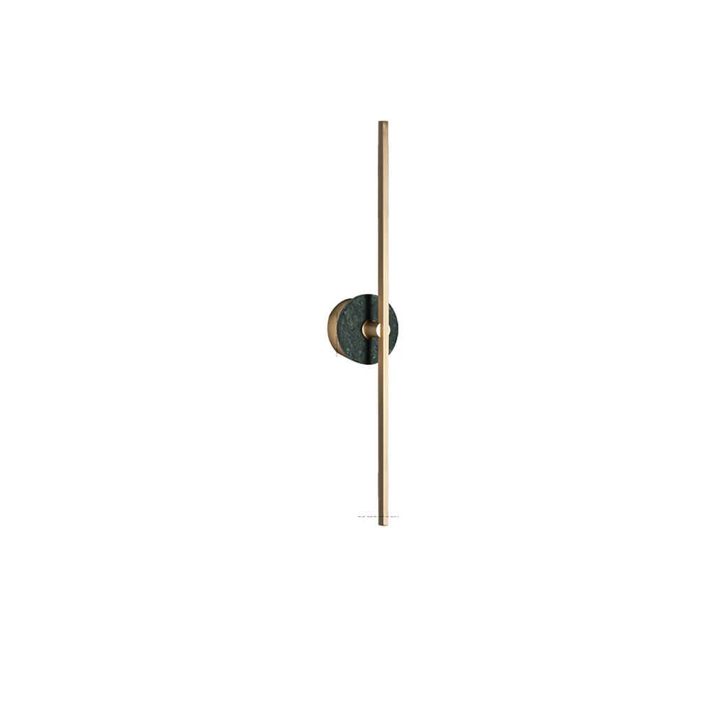 Clérachic wall light on white, a green stone disc set lower on its brass bar than in other studio shots.
