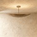 Clérachic ceiling light in vintage brass, a curved boat-shaped shade with pierced dot perforations.