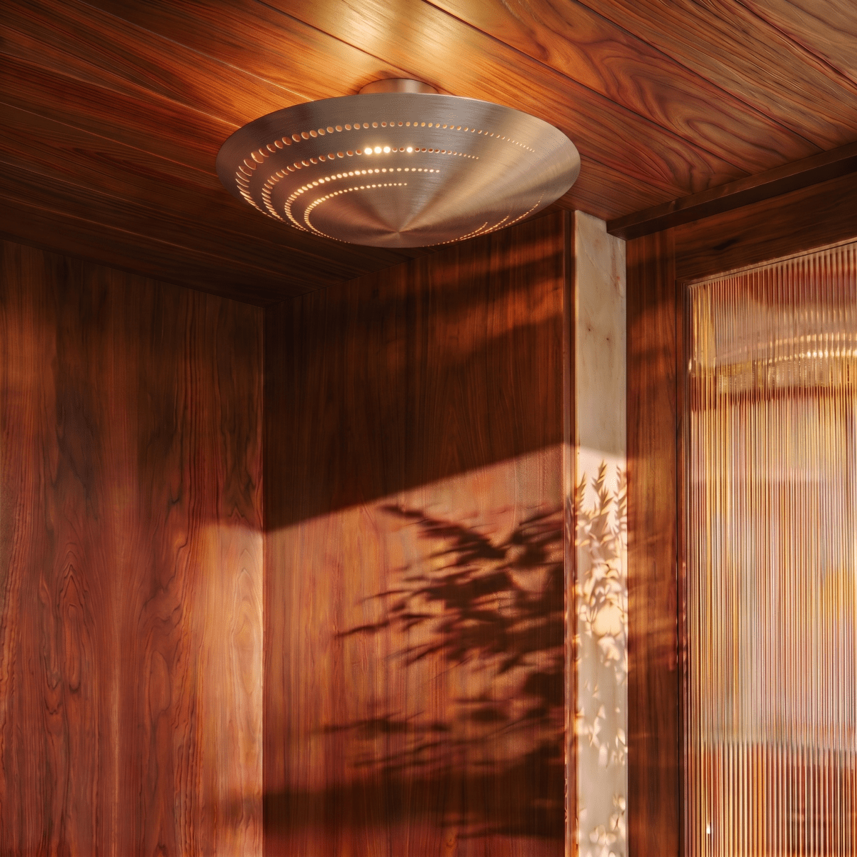 Clérachic ceiling light in chrome glowing in a wood-paneled corner beside a woven strand curtain.