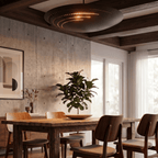 Clérachic ceiling light in matte black glowing above a wood dining table beside a concrete accent wall.