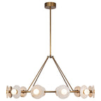 The Clérachic 12-Light Alabaster Ring Chandelier seen at eye level in copper, four lit globes glowing along the front of the ring.