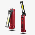 Clérachic folding work light in red, shown from both sides with its COB panel swung open.