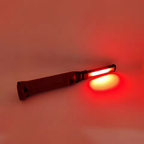 The Clérachic work light in red warning mode, its side panel throwing a red glow.