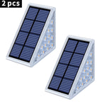 Two Clérachic triangular solar step lights, solar panels above the LED face, sold as a pair.