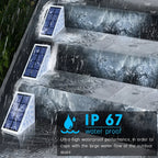 Clérachic step lights in heavy rain on stone stairs, marked with an IP67 waterproof rating.